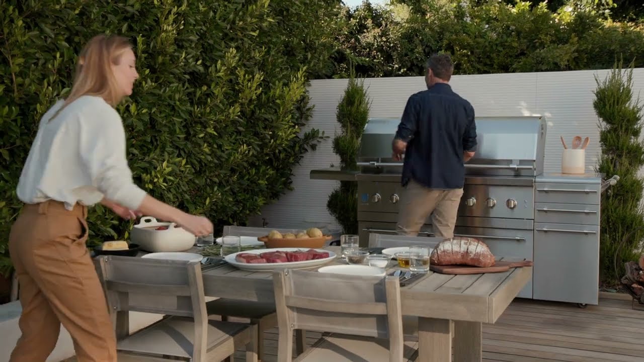 American Made Grills Video - Outdoor Cooking Redefined, Couple grilling in backyard